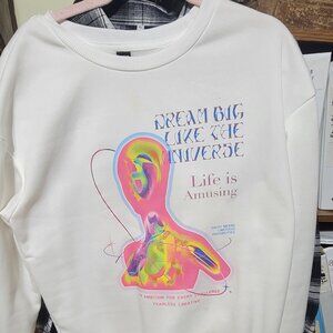 Multicolored sweater with printed design